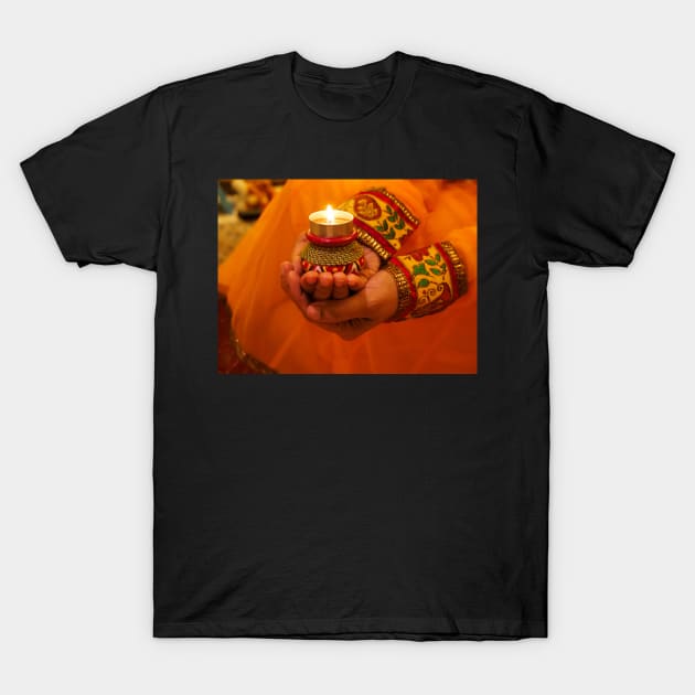 Decorative oil lamp in hand Diwali festival T-Shirt by fantastic-designs